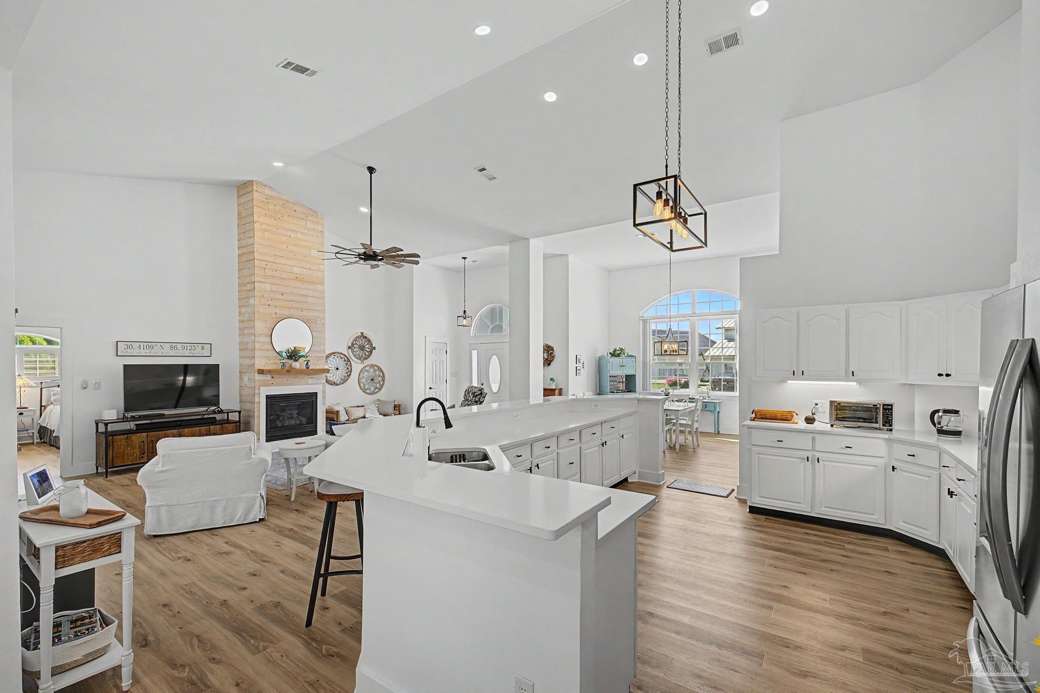 2005 Riviera Lane South Navarre, FL 32566 - Photo 41 of 70 a large kitchen with lots of counter space and wooden floor