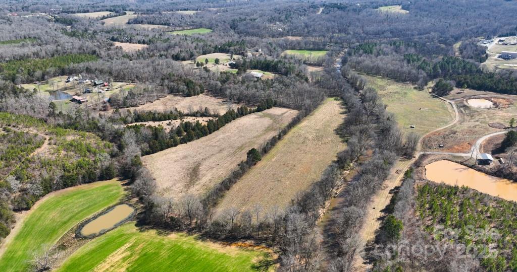 3400 Biggers Road Concord, NC 28025 - Photo 20 of 21 a view of a yard with mountain