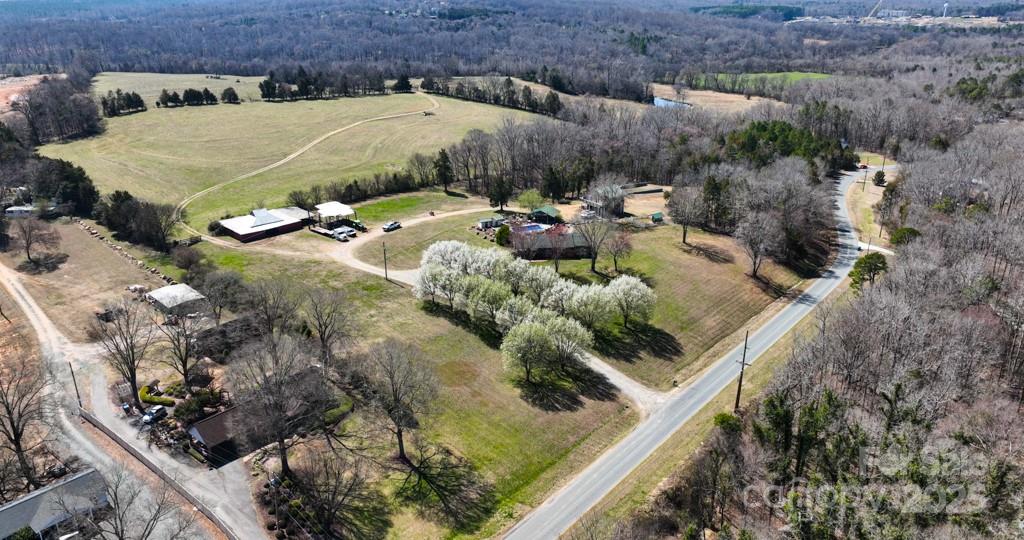 3400 Biggers Road Concord, NC 28025 - Photo 6 of 21 a view of a backyard with outdoor seating