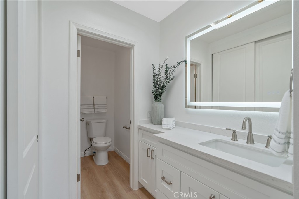 900 Cedar Street, Unit 308 El Segundo, CA 90245 - Photo 18 of 29 a bathroom with a double vanity sink toilet and shower