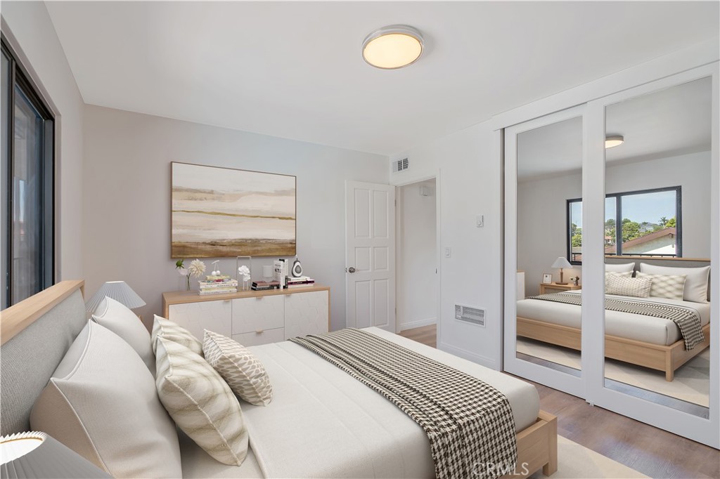 900 Cedar Street, Unit 308 El Segundo, CA 90245 - Photo 19 of 29 a bedroom with a bed and a couch