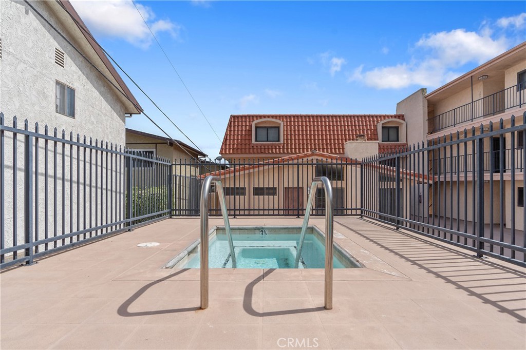 900 Cedar Street, Unit 308 El Segundo, CA 90245 - Photo 26 of 29 a view of a house with wooden fence