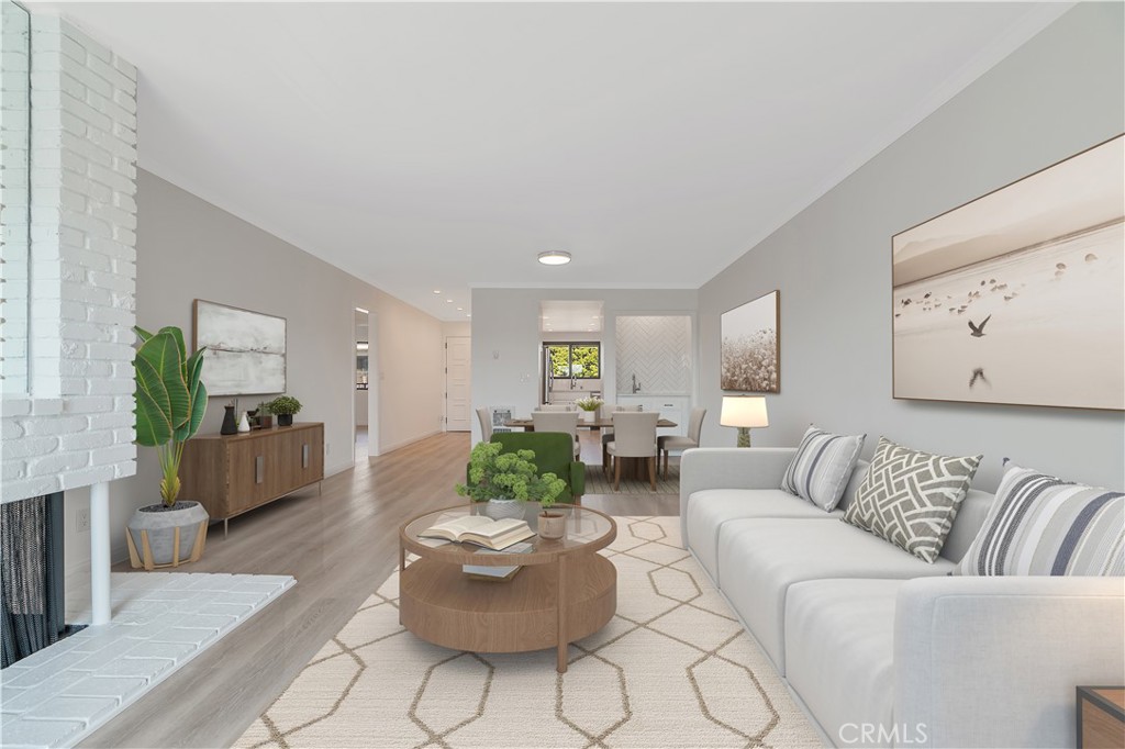 900 Cedar Street, Unit 308 El Segundo, CA 90245 - Photo 3 of 29 a living room with furniture and a potted plant