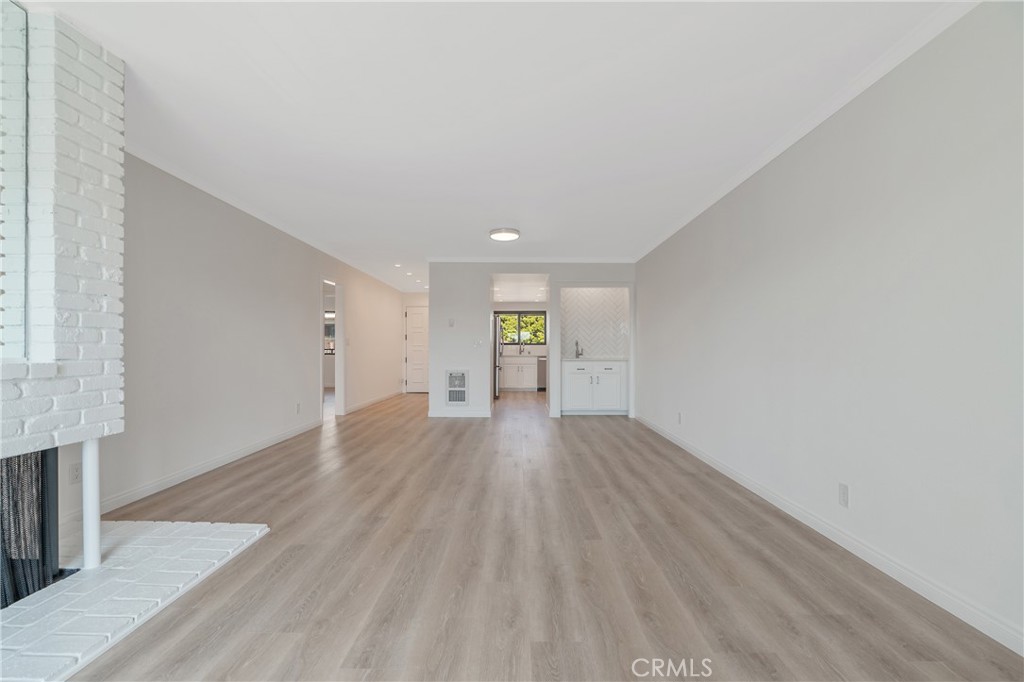 900 Cedar Street, Unit 308 El Segundo, CA 90245 - Photo 5 of 29 wooden floor in an empty room with a window