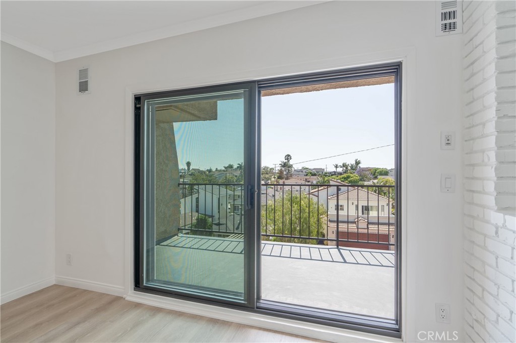900 Cedar Street, Unit 308 El Segundo, CA 90245 - Photo 10 of 29 a view of a glass door and a window