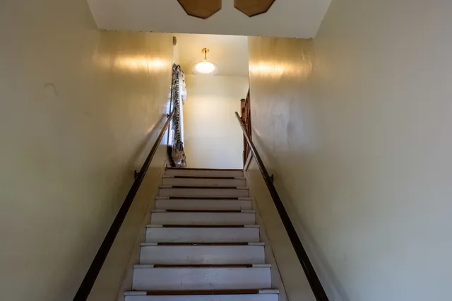 a utility room with a sink dryer and washer