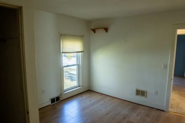an empty room with windows