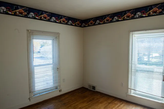 a view of a town with large trees