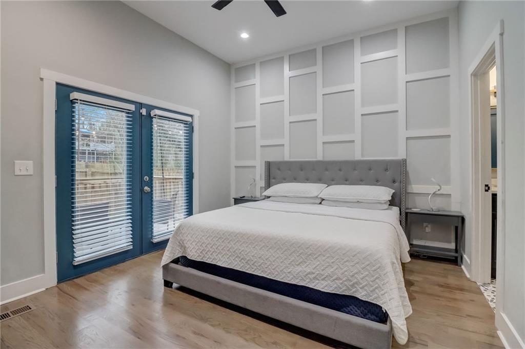 975 Welch Street Southwest Atlanta, GA 30310 - Photo 12 of 27 a bedroom with a bed and a window