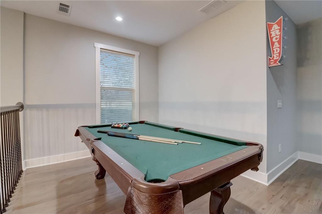 975 Welch Street Southwest Atlanta, GA 30310 - Photo 17 of 27 a room with pool table and windows