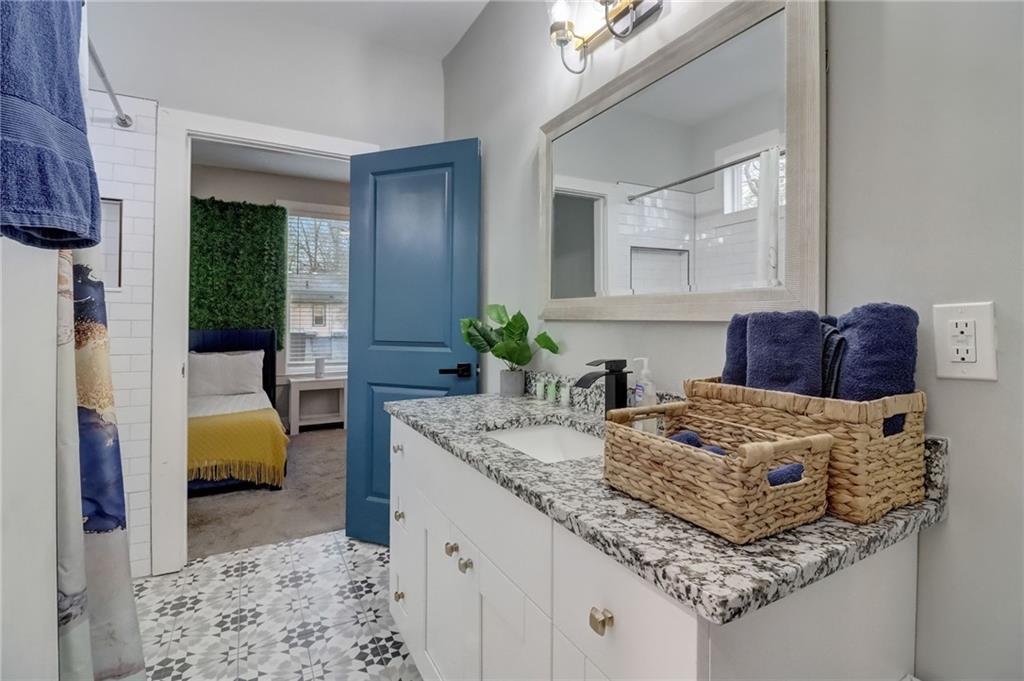 975 Welch Street Southwest Atlanta, GA 30310 - Photo 20 of 27 a living room with granite countertop furniture and fireplace