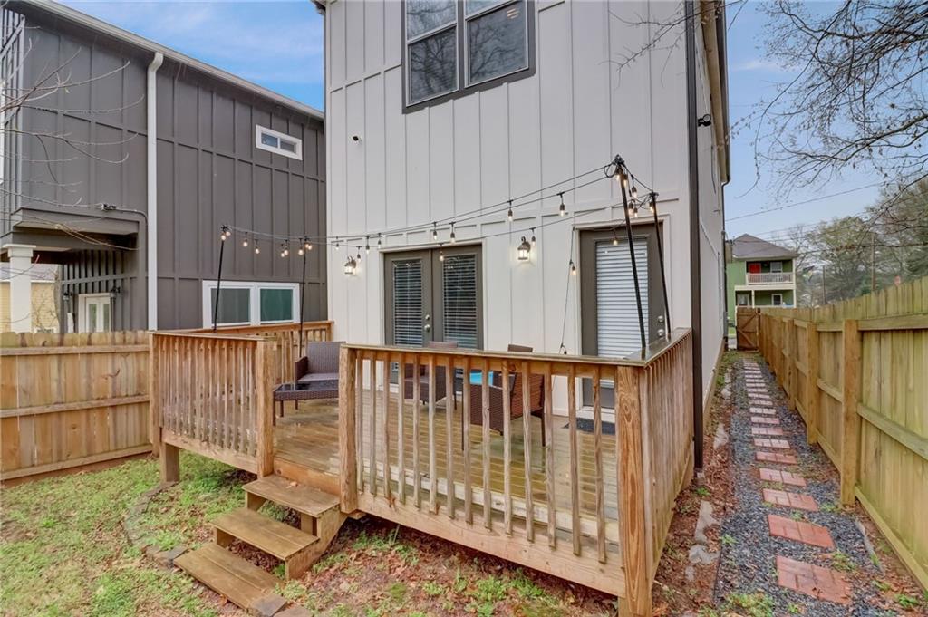 975 Welch Street Southwest Atlanta, GA 30310 - Photo 24 of 27 a view of a house with wooden floor
