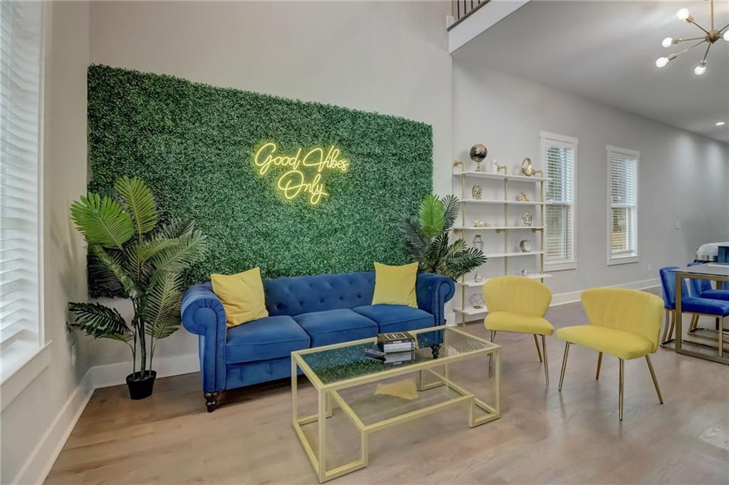 975 Welch Street Southwest Atlanta, GA 30310 - Photo 3 of 27 a living room with furniture and a rug