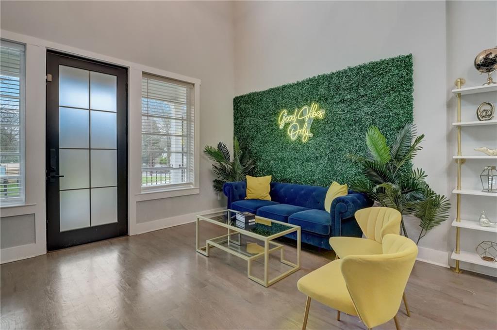 975 Welch Street Southwest Atlanta, GA 30310 - Photo 4 of 27 a living room with furniture and a large window