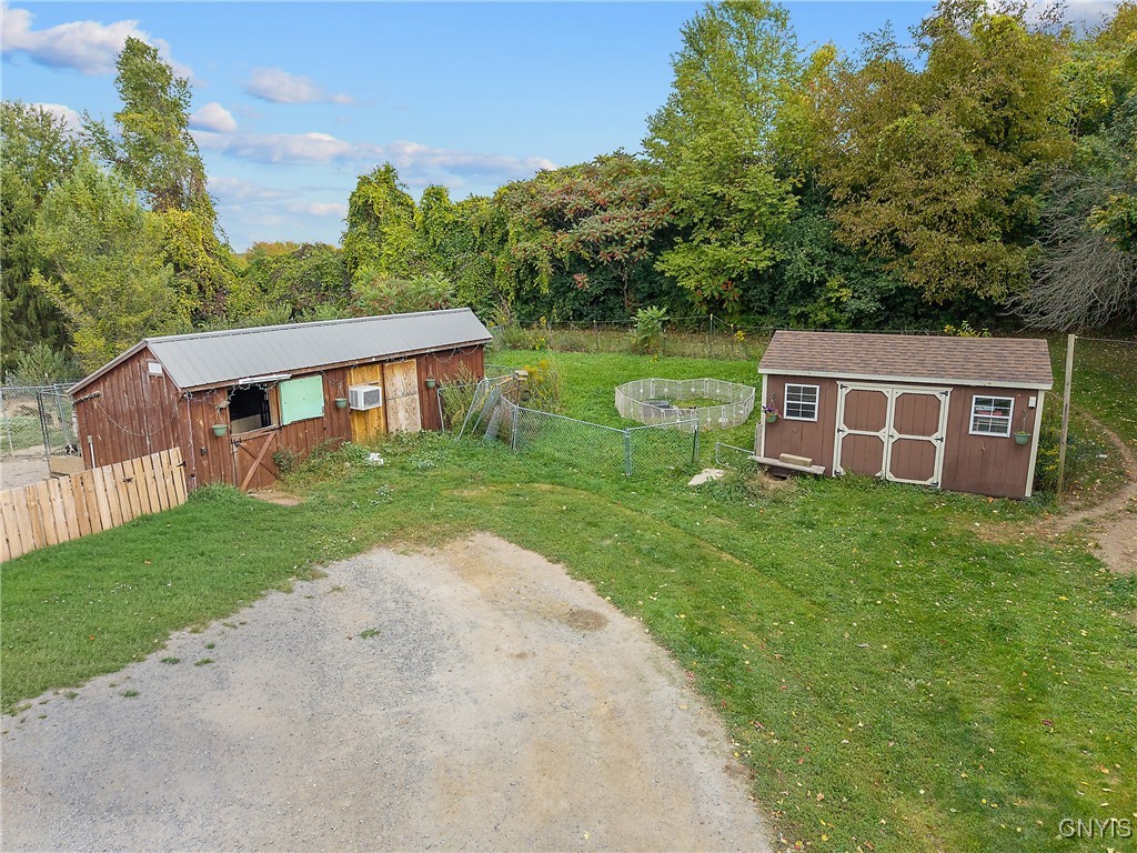 693 Masters Road Elbridge, NY 13060 - Photo 17 of 29 Insulated kennel building with 5 doggy doors, conc
