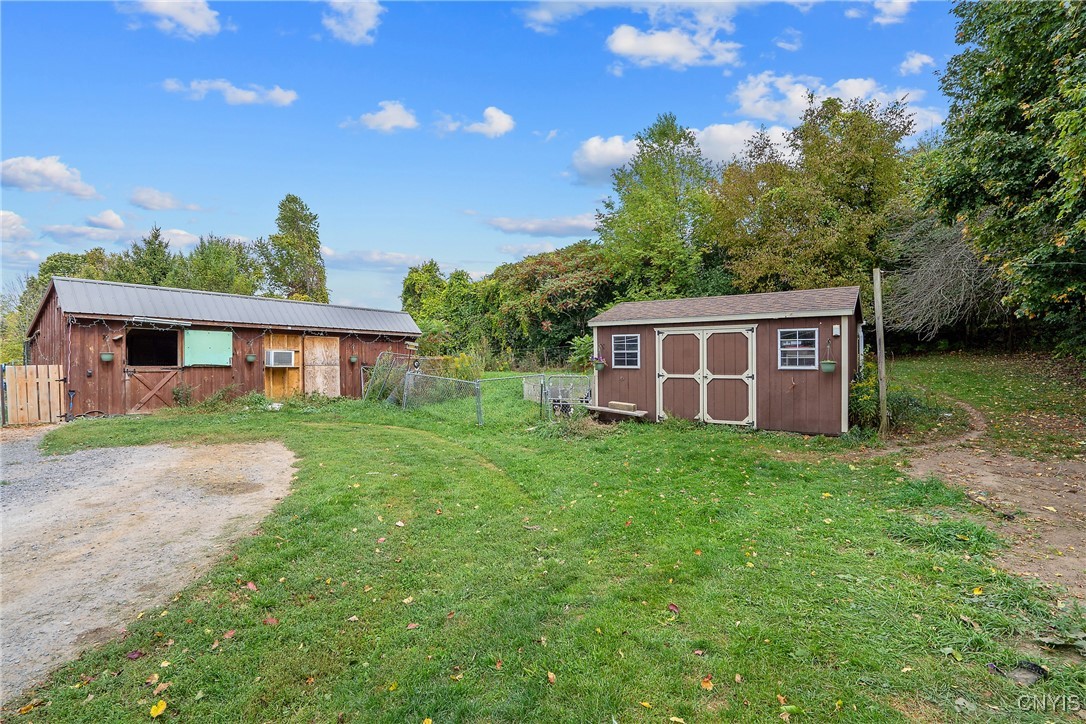 693 Masters Road Elbridge, NY 13060 - Photo 10 of 29 Insulated kennel building with 5 doggy doors, conc
