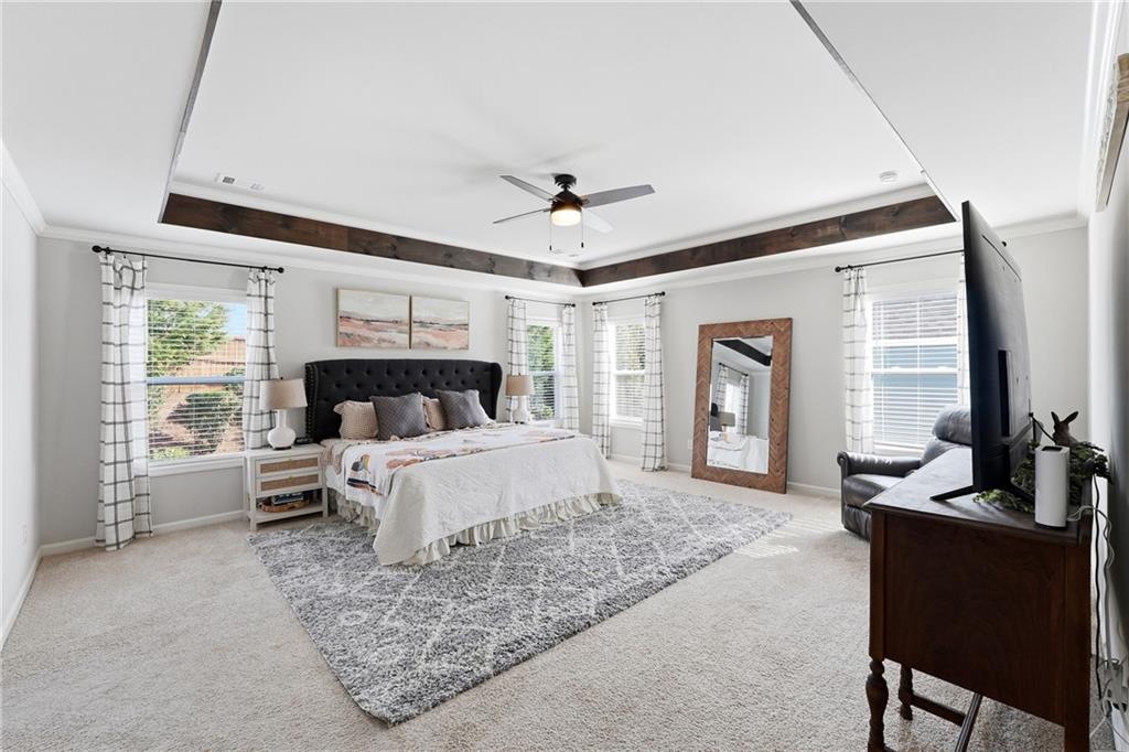 121 Treeline Trail Canton, GA 30115 - Photo 15 of 26 a bed room with a bed and a chair