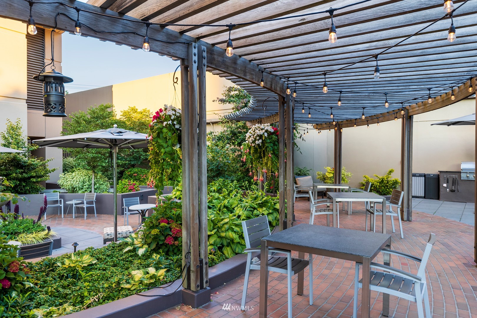 1301 Spring Street, Unit 30J Seattle, WA 98104 - Photo 35 of 40 a outdoor space with chairs