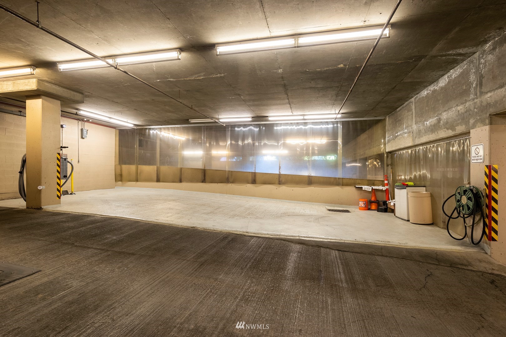 1301 Spring Street, Unit 30J Seattle, WA 98104 - Photo 39 of 40 a view of a room with gym equipment