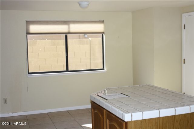 1837 East Redfield Road Phoenix, AZ 85022 - Photo 3 of 14 Kitchen with eat-in area