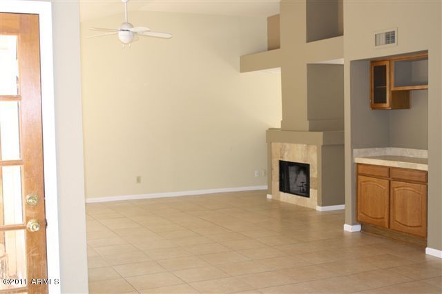 1837 East Redfield Road Phoenix, AZ 85022 - Photo 5 of 14 Fireplace & Bar Area
