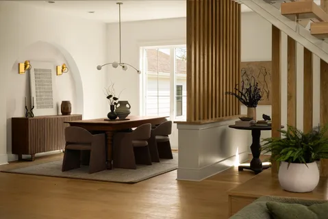 a living room with stainless steel appliances kitchen island granite countertop furniture and a kitchen view