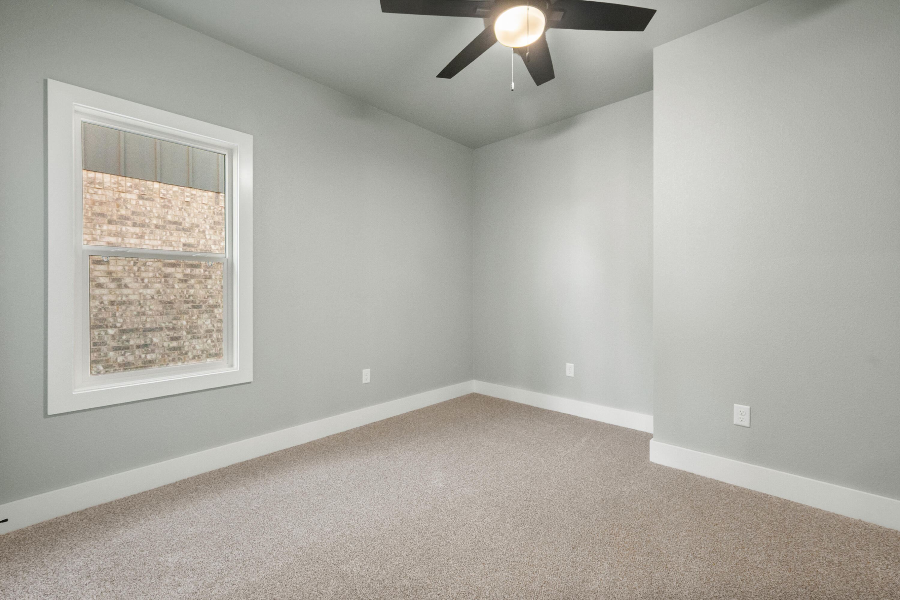1121 North 6th Street Wolfforth, TX 79382 - Photo 23 of 31 an empty room with a window