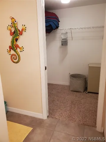 a view of small space with racks on the wall