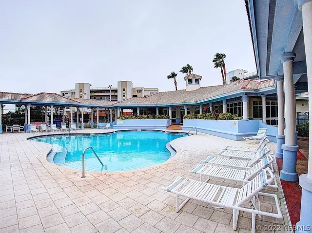 a view of a living room and mountain view