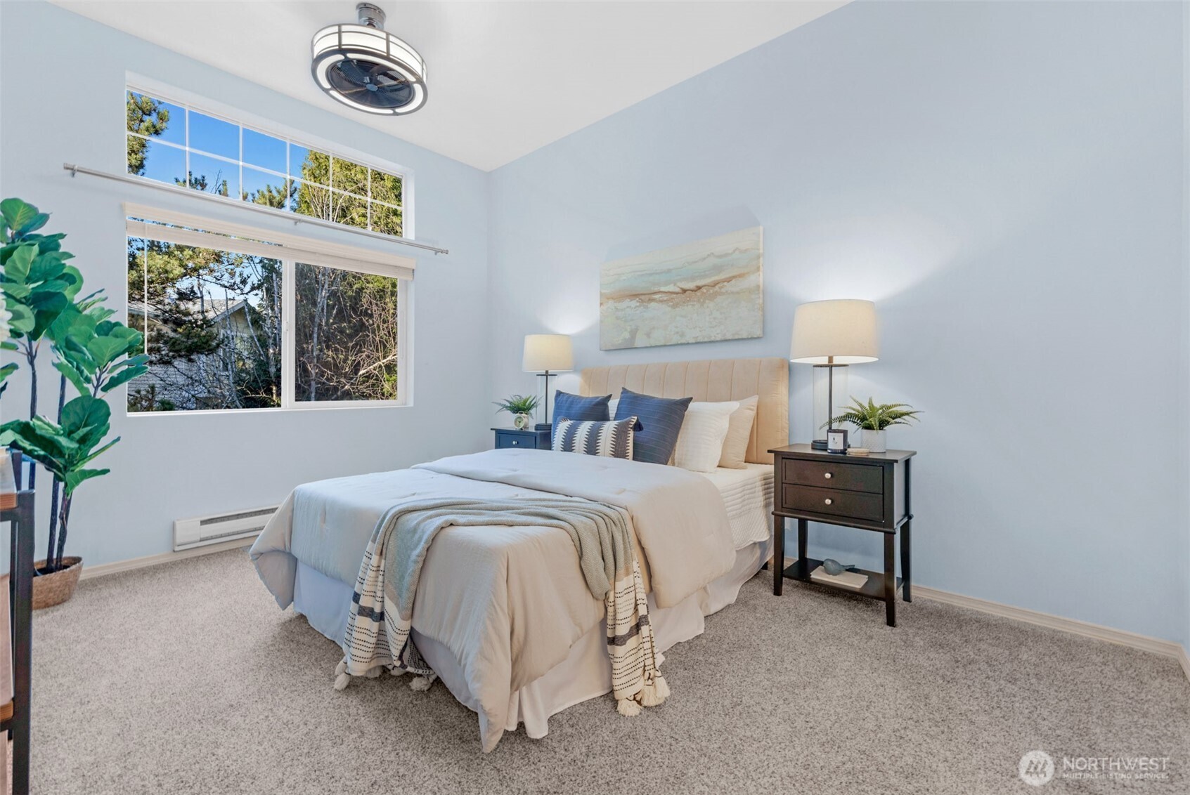 14007 69th Drive Southeast, Unit R2 Snohomish, WA 98296 - Photo 14 of 21 a bedroom with a bed and a potted plant