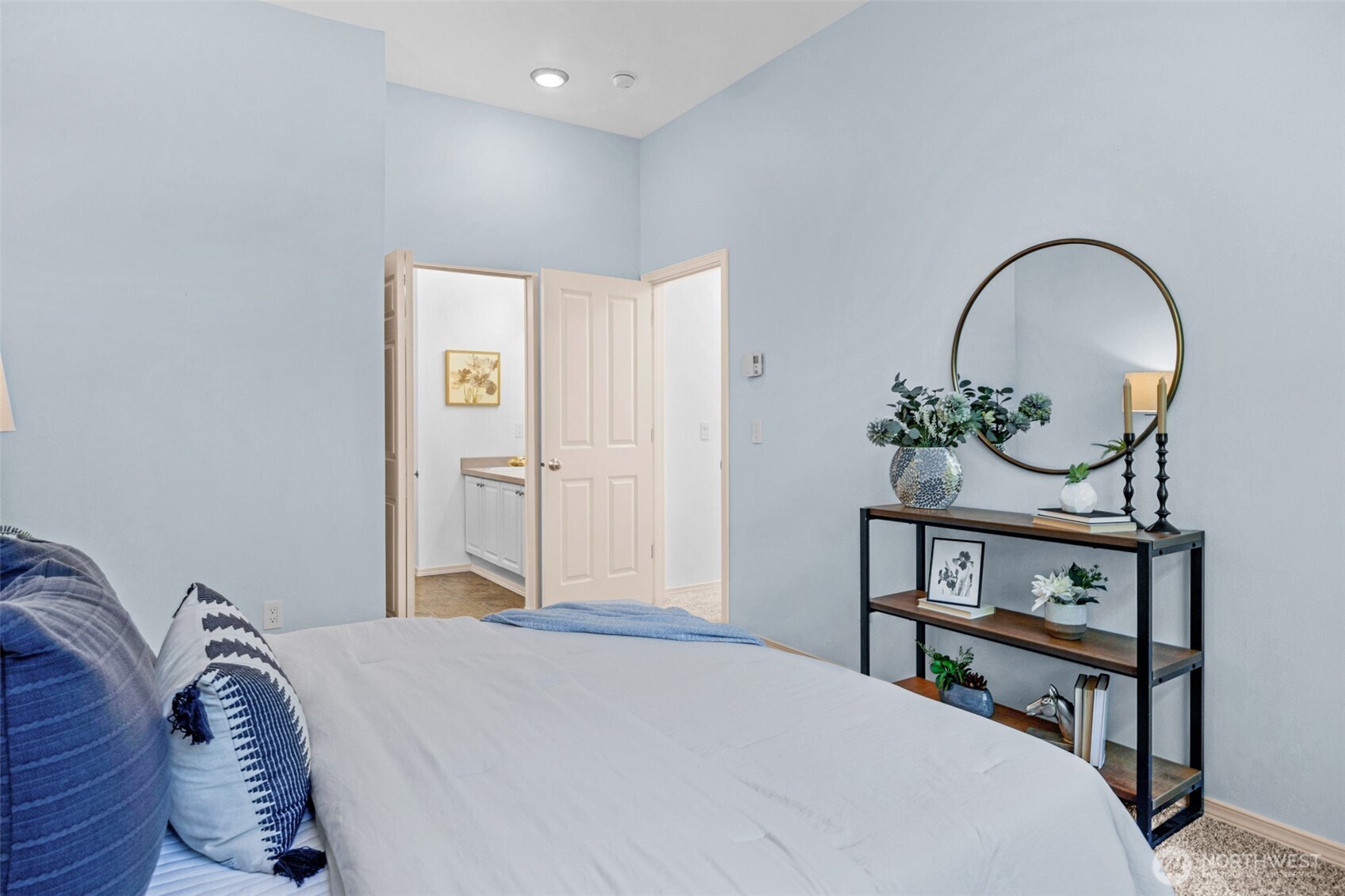 14007 69th Drive Southeast, Unit R2 Snohomish, WA 98296 - Photo 15 of 21 a bedroom with bed and a chandelier