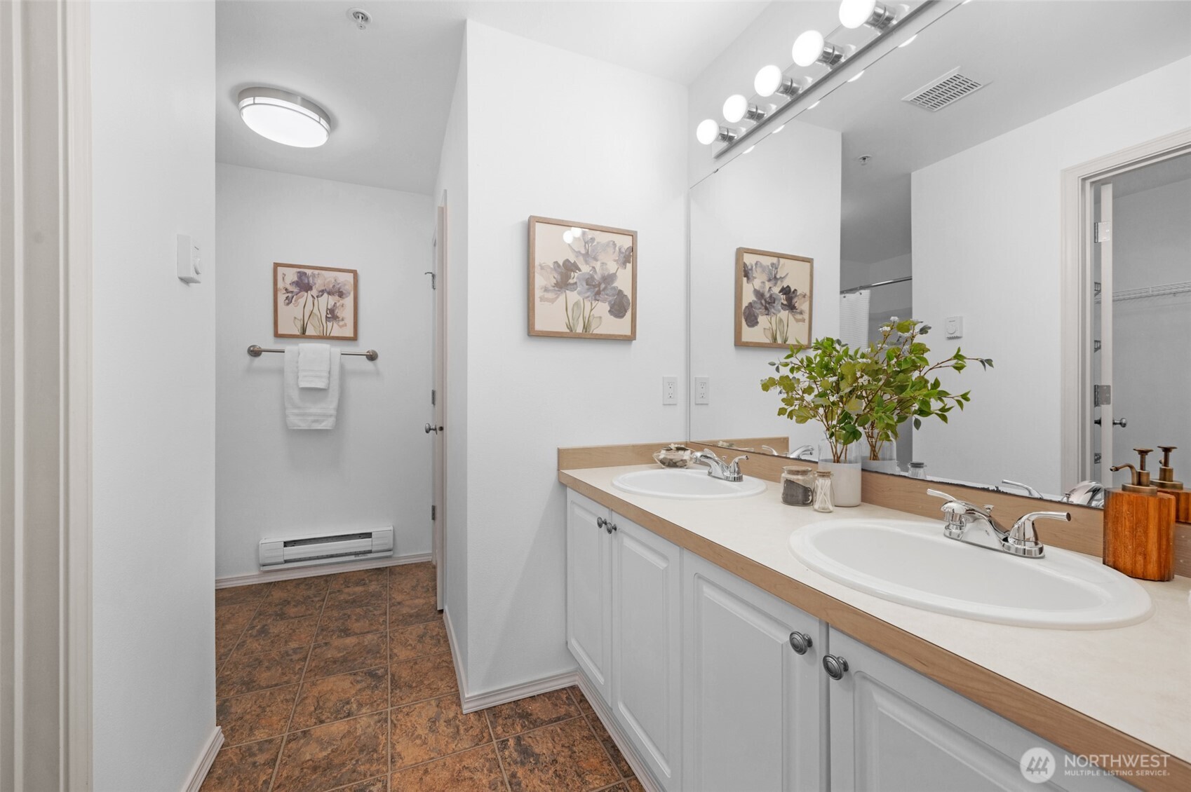 14007 69th Drive Southeast, Unit R2 Snohomish, WA 98296 - Photo 16 of 21 a bathroom with a sink vanity and a mirror