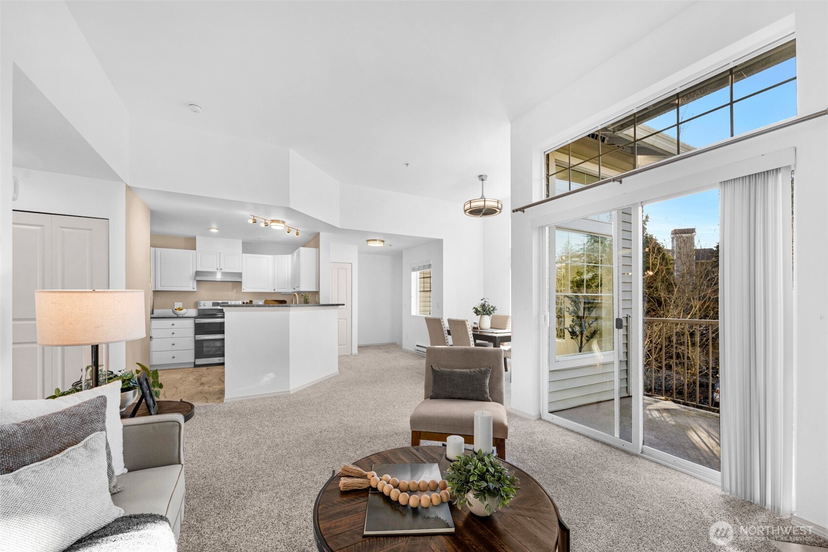14007 69th Drive Southeast, Unit R2 Snohomish, WA 98296 - Photo 6 of 21 a living room with furniture and a table