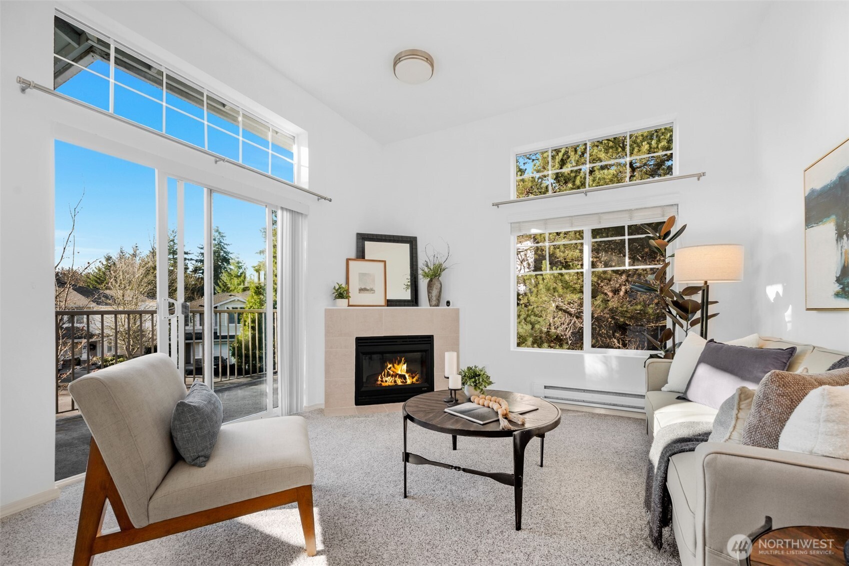 14007 69th Drive Southeast, Unit R2 Snohomish, WA 98296 - Photo 8 of 21 a living room with furniture and a fireplace