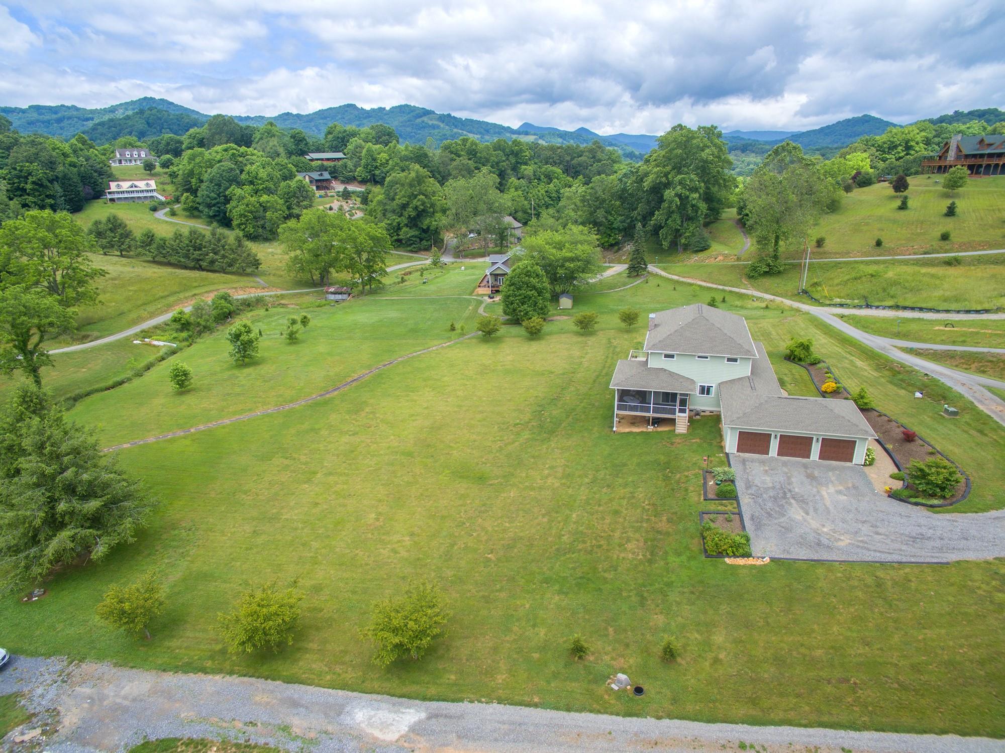 750 Iron Tree Drive Clyde, NC 28721 - Photo 18 of 40 an aerial view of a house