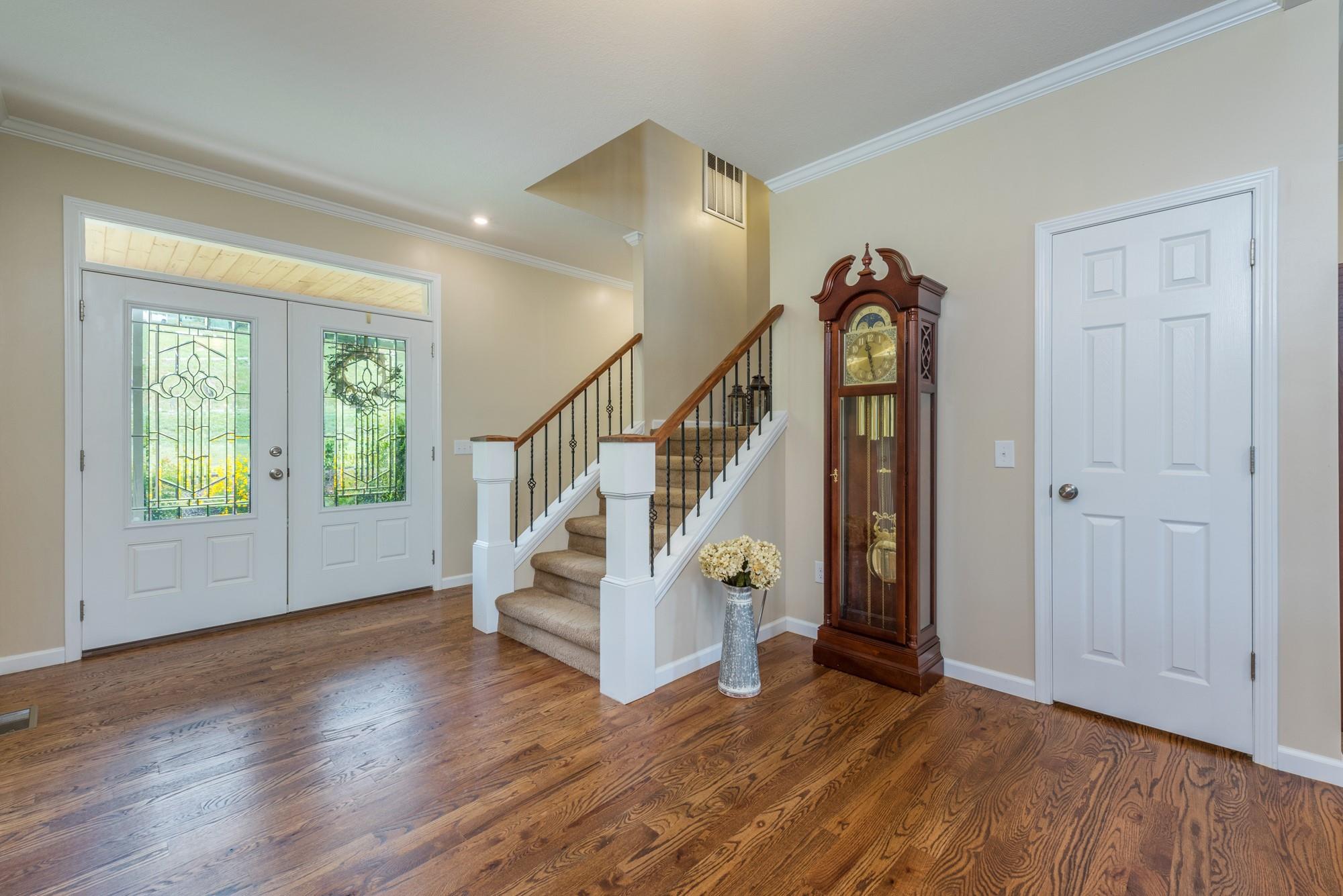 750 Iron Tree Drive Clyde, NC 28721 - Photo 21 of 40 a view of entryway with wooden floor and stairs