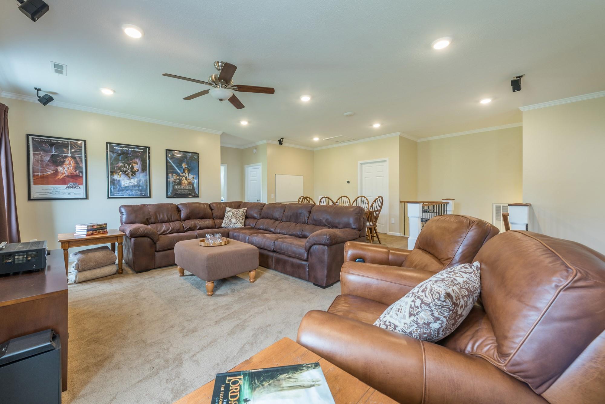 750 Iron Tree Drive Clyde, NC 28721 - Photo 35 of 40 a living room with furniture and a ceiling fan