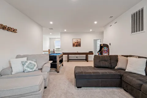 a living room with furniture and a couch