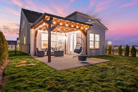 a view of a house with entertaining space