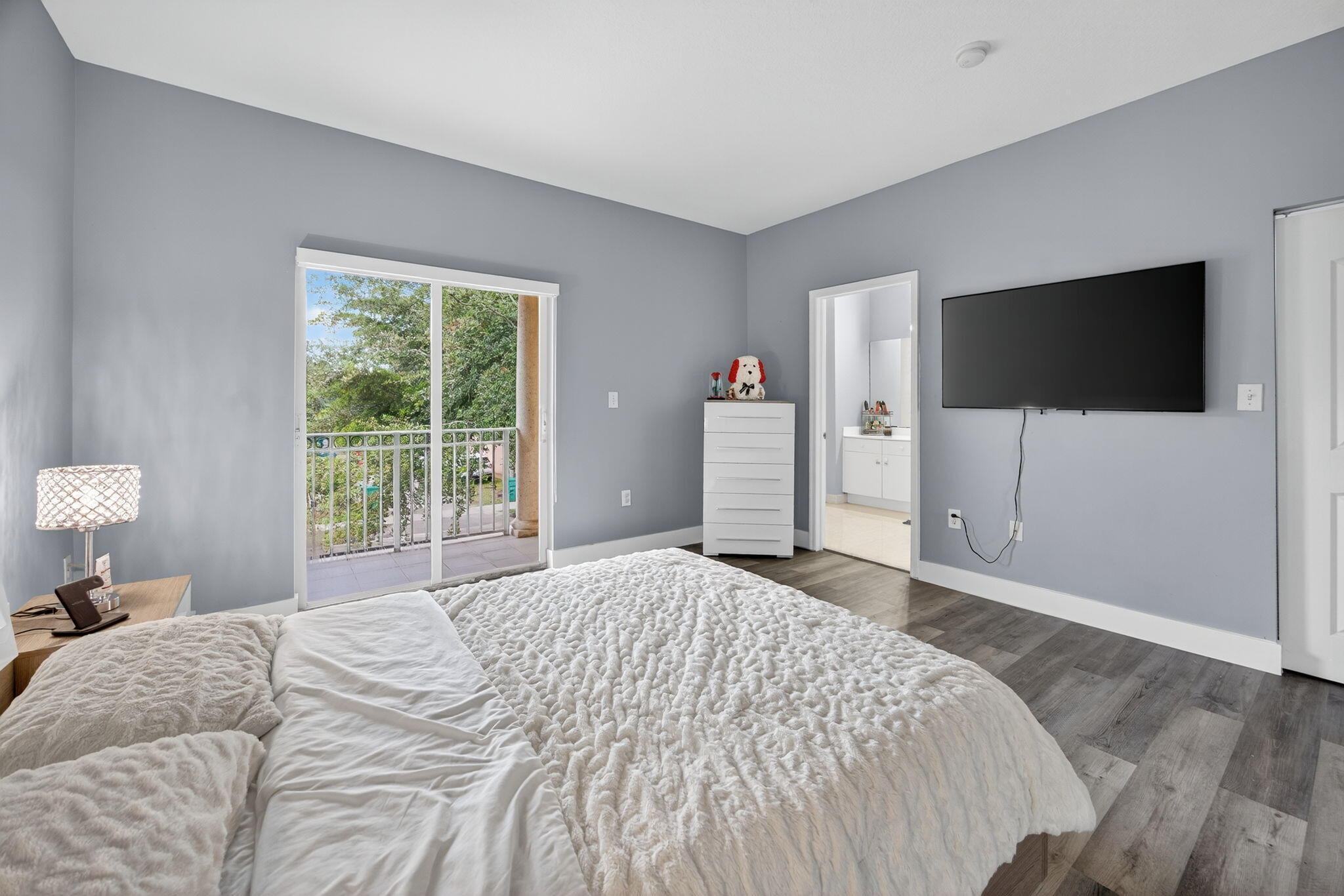 23125 Southwest 112th Court Miami, FL 33170 - Photo 12 of 24 a bedroom with a bed and a flat screen tv