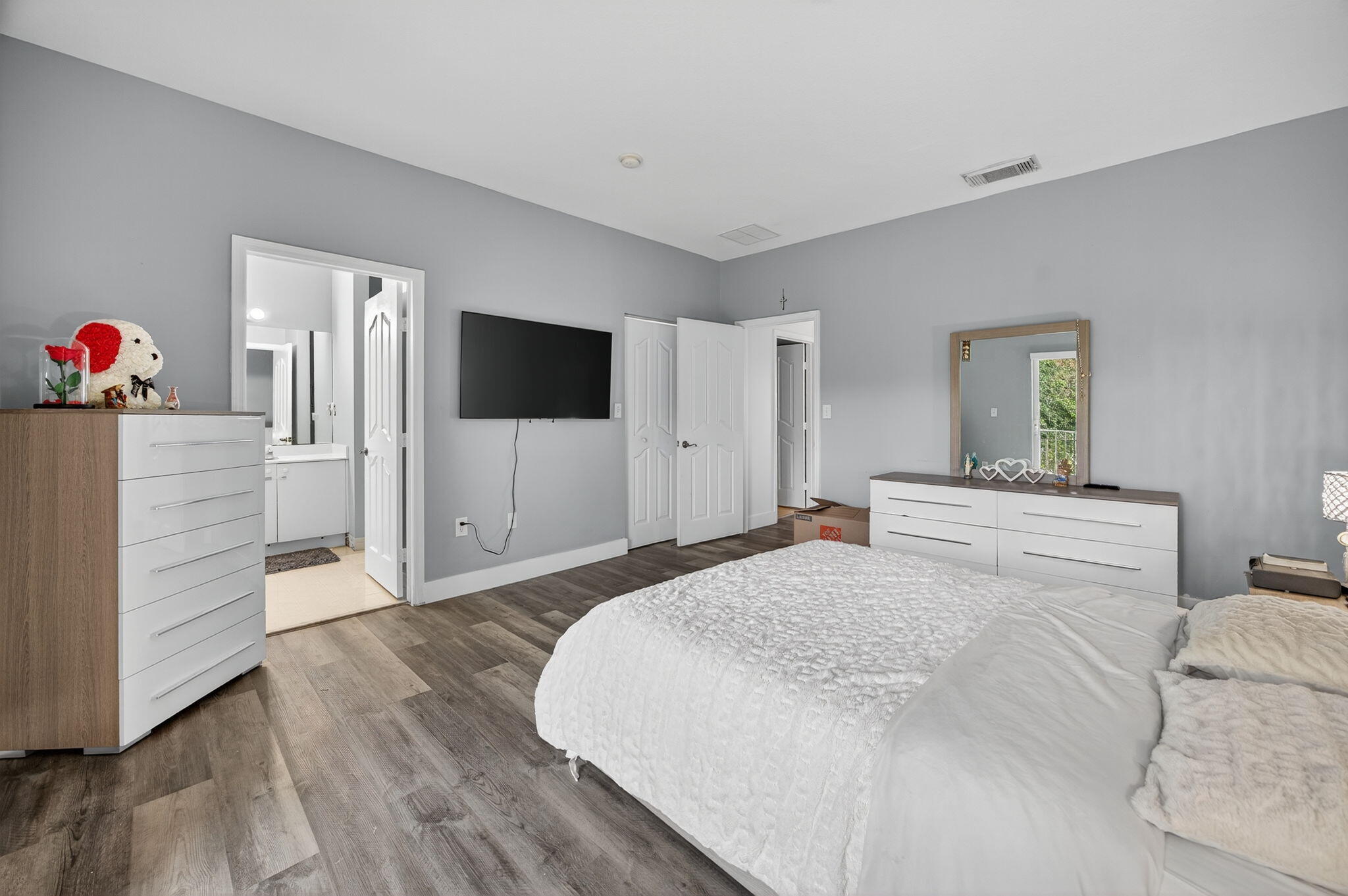 23125 Southwest 112th Court Miami, FL 33170 - Photo 13 of 24 a bedroom with a bed and a flat screen tv