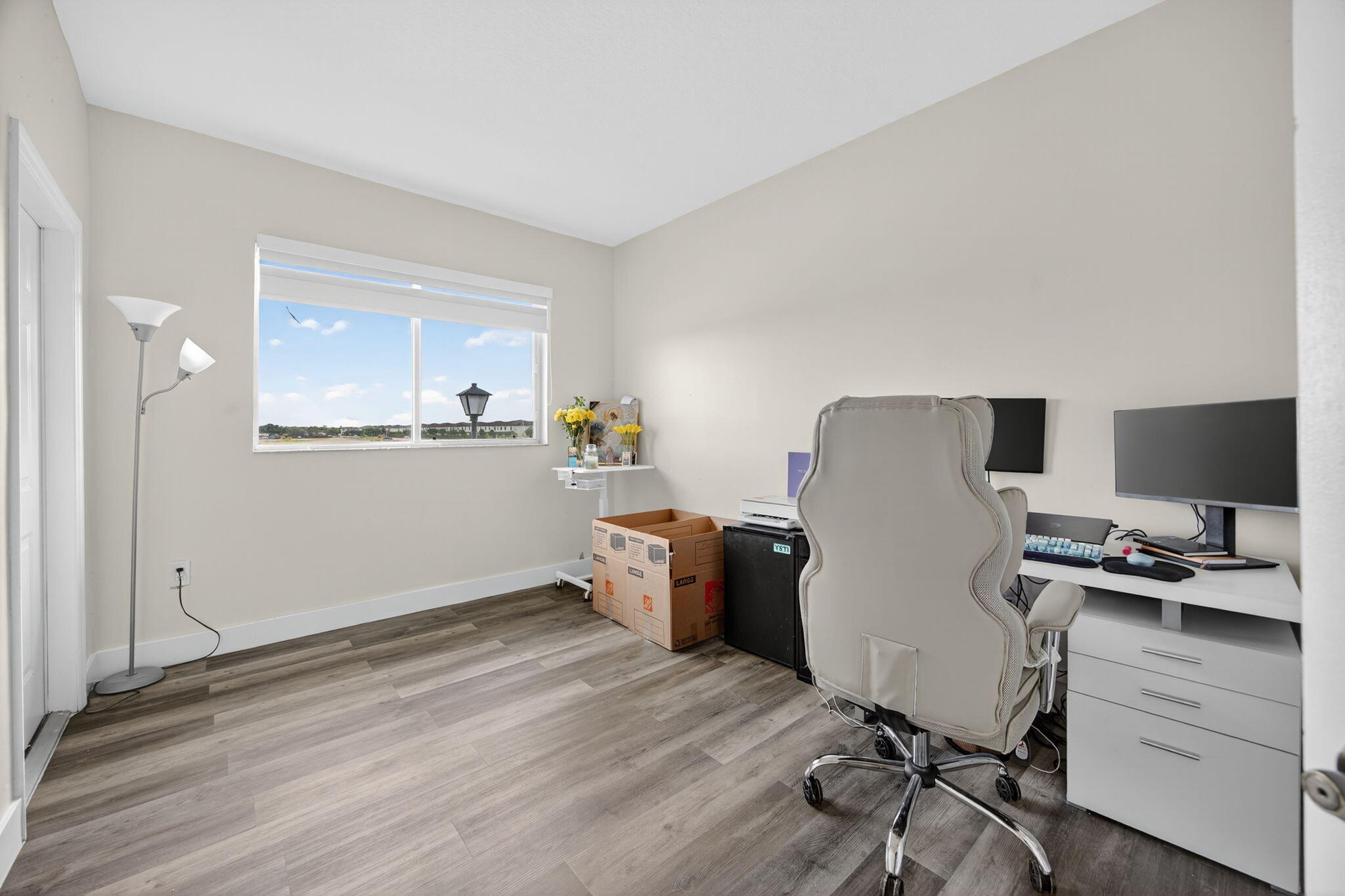 23125 Southwest 112th Court Miami, FL 33170 - Photo 18 of 24 a workspace with furniture and wooden floor