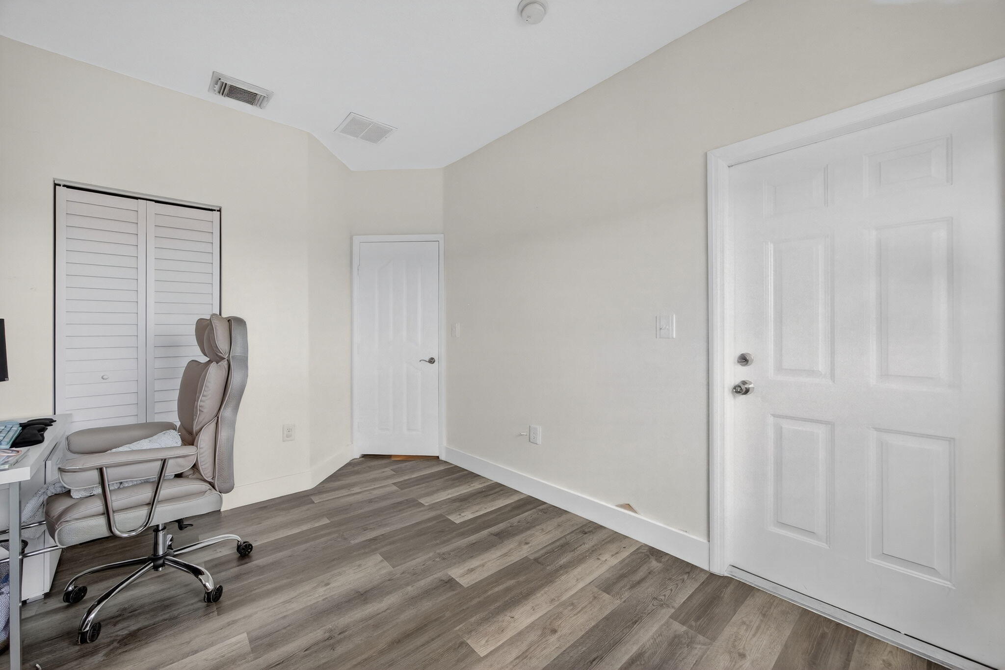 23125 Southwest 112th Court Miami, FL 33170 - Photo 19 of 24 a view of workspace with wooden floor windows