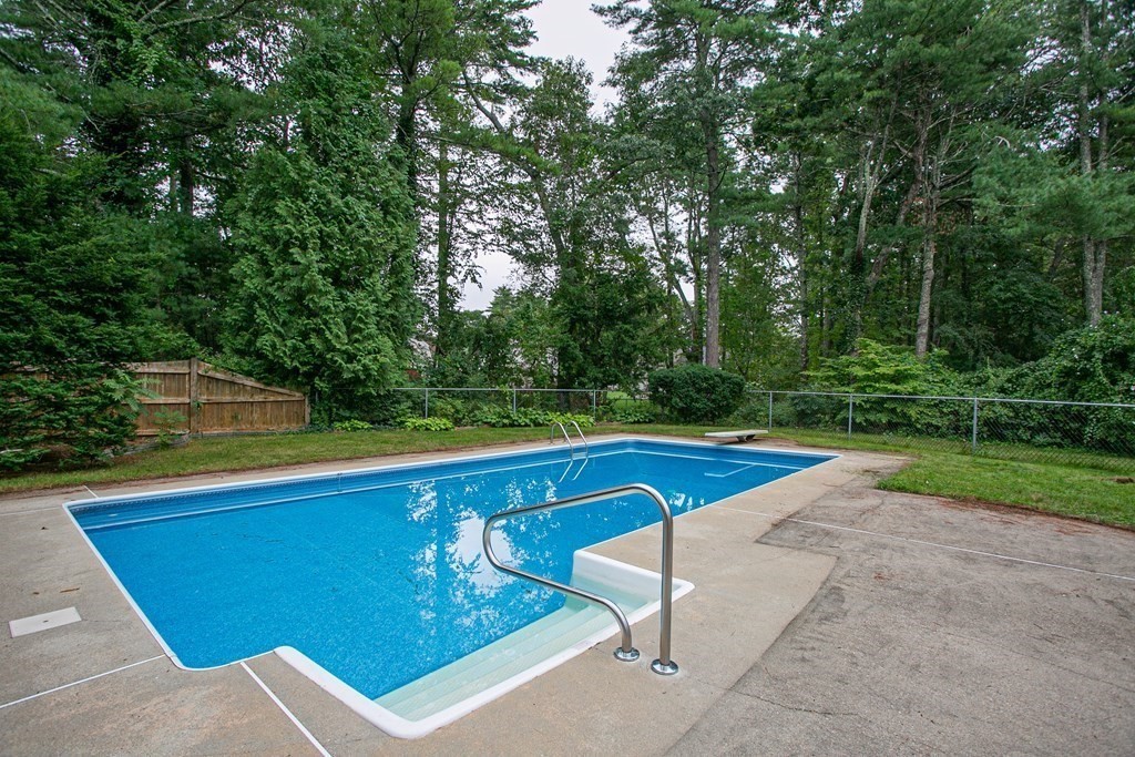 36 Morton Road Freetown, MA 02717 - Photo 12 of 40 a view of a swimming pool with a yard