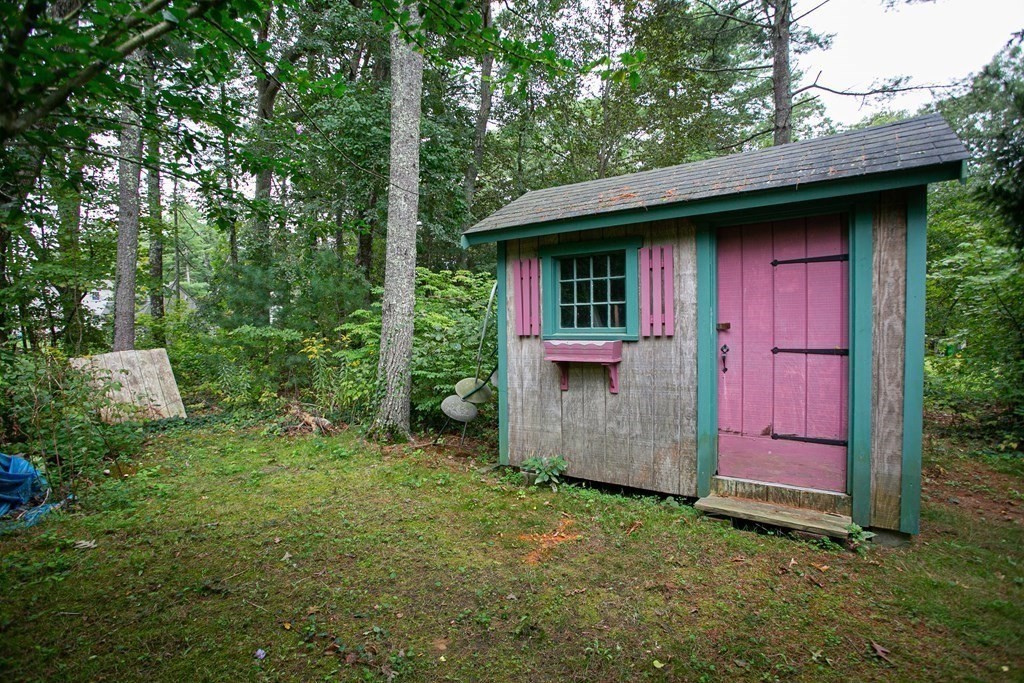 36 Morton Road Freetown, MA 02717 - Photo 13 of 40 a view of a house with a yard