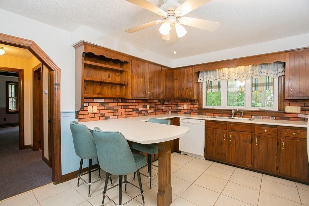 36 Morton Road Freetown, MA 02717 - Photo 15 of 40 a kitchen with a sink cabinets and window
