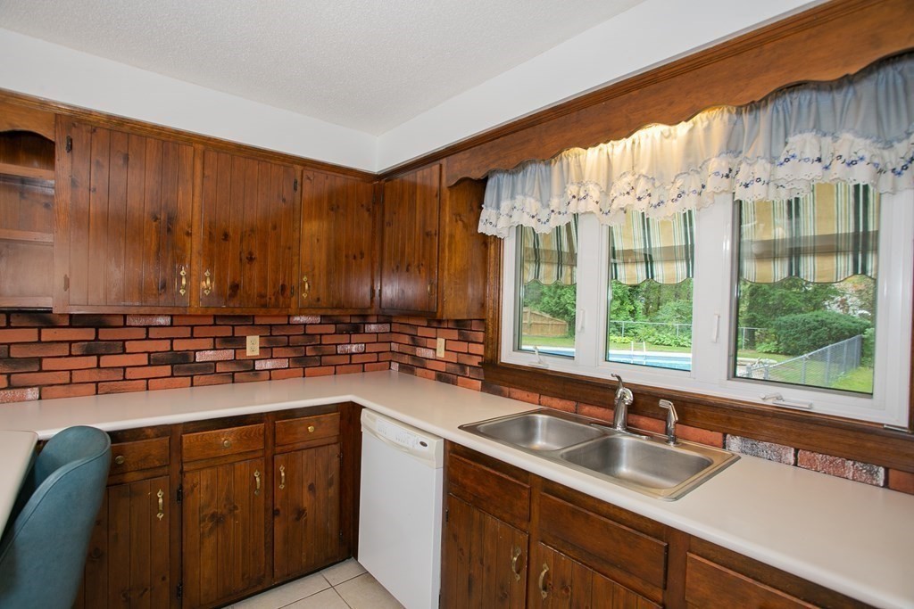36 Morton Road Freetown, MA 02717 - Photo 18 of 40 a kitchen with a sink and a window