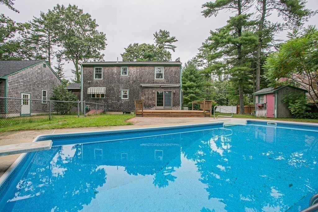 36 Morton Road Freetown, MA 02717 - Photo 2 of 40 a view of a house with swimming pool