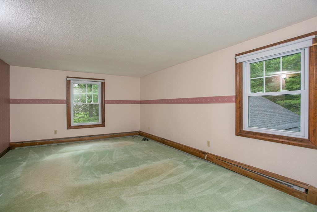 36 Morton Road Freetown, MA 02717 - Photo 27 of 40 a view of a room that has a window in it
