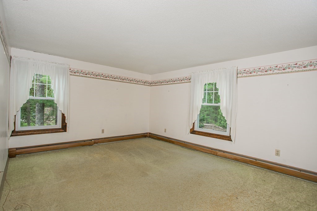 36 Morton Road Freetown, MA 02717 - Photo 29 of 40 an empty room with windows